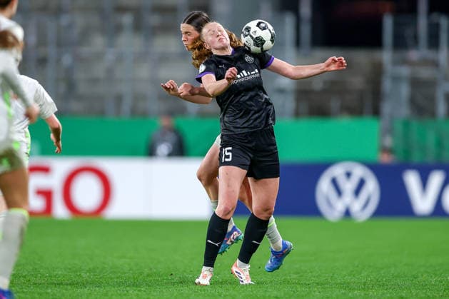 2026 03 11, Football, DFB Cup Women, SGS Essen SV Werder Bremen, Quarterfinals, Stadion an der Hafenstraße, Women, Season 2025 2026 Laura Pucks SGS Essen 15 in duel against Lara Schmidt Werder Bremen 24 DFB regulations prohibit any use of photographs as image sequences and or quasi video North Rhine-Westphalia Germany