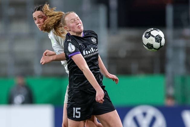 2026 03 11, Football, DFB Cup Women, SGS Essen SV Werder Bremen, Quarterfinals, Stadion an der Hafenstraße, Women, Season 2025 2026 Laura Pucks SGS Essen 15 in duel against Lara Schmidt Werder Bremen 24 DFB regulations prohibit any use of photographs as image sequences and or quasi video North Rhine-Westphalia Germany