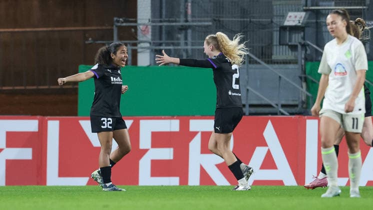 from left goal scorer Ella Touon SGS Essen, 32 and Julie Terlinden SGS Essen, 2 with goal celebration, cheering, jubilant, optimistic, game scene, highlight, joy about the goal for 1 0, THE DFB REGULATIONS PROHIBIT ANY USE OF PHOTOGRAPHS AS IMAGE SEQUENCES AND OR QUASI VIDEO , 11 03 2026, Essen Germany , Football, DFB Cup Women, SGS Essen SV Werder Bremen xobx