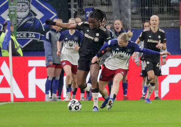 Duel between Edna Imade FC Bayern Muenchen and Maria Mikolajova HSV Football, Season 2025 2026, Women, DFB Cup, Quarterfinal, Volksparkstadion Hamburg, Hamburger SV vs FC Bayern Muenchen DFL REGULATIONS PROHIBIT ANY USE OF PHOTOGRAPHS AS IMAGE SEQUENCES AND OR QUASI VIDEO