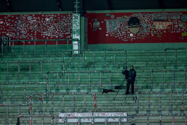 2026 03 11, Football, DFB Pokal Women, SGS Essen SV Werder Bremen, Quarterfinals, Stadion an der Hafenstraße, Women, Season 2025 2026 A lone cameraman stands on the deserted grandstand Feature empty grandstand DFB regulations prohibit any use of photographs as image sequences and or quasi video North Rhine-Westphalia Germany