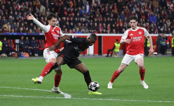 V l Martin Zubimendi Arsenal , Christian Kofane B04 and Declan Rice Arsenal , UEFA Champions League, UCL, Round of 16, Bayer 04 Leverkusen vs Arsenal London, Bayarena Leverkusen, Germany, 11 03 2026