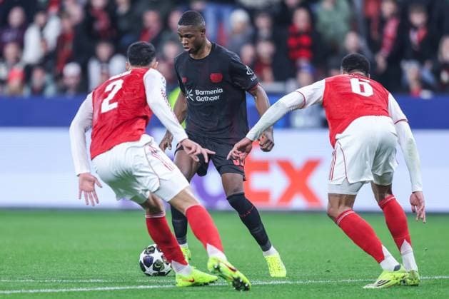Soccer Champions League Round of 16 Bayer 04 Leverkusen FC Arsenal on 11 03 2026 at the BayArena in Leverkusen William Saliba Arsenal , left Christian Kofane Leverkusen , center Gabriel Magalhaes Arsenal , right xJRx