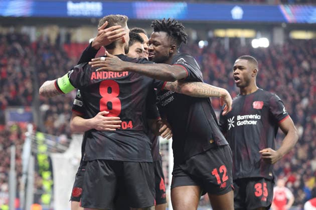 Robert Andrich Bayer 04 Leverkusen celebrates after scoring his team s first goal with teammates during the UEFA Champions League 2025 26 Round of 16 First Leg match between Bayer 04 Leverkusen and Arsenal FC at BayArena on March 11, 2026 in Leverkusen, Germany Photo by Oliver Kaelke DeFodi Images