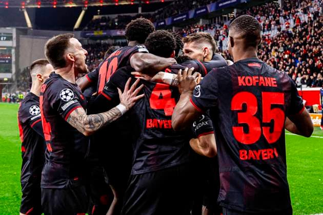 Robert Andrich of Bayer 04 Leverkusen celebrates with teammates after scoring his teams first goal Bayer 04 Leverkusen v Arsenal FC, UEFA Champions League 2025 26 Round of 16 First Leg, Bayer 04 Leverkusen v Arsenal FC, BayArena, March 11, 2026, Leverkusen, Germany.