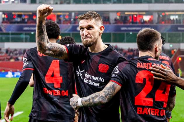 Robert Andrich of Bayer 04 Leverkusen celebrates with teammates after scoring his teams first goal Bayer 04 Leverkusen v Arsenal FC, UEFA Champions League 2025 26 Round of 16 First Leg, Bayer 04 Leverkusen v Arsenal FC, BayArena, March 11, 2026, Leverkusen, Germany.