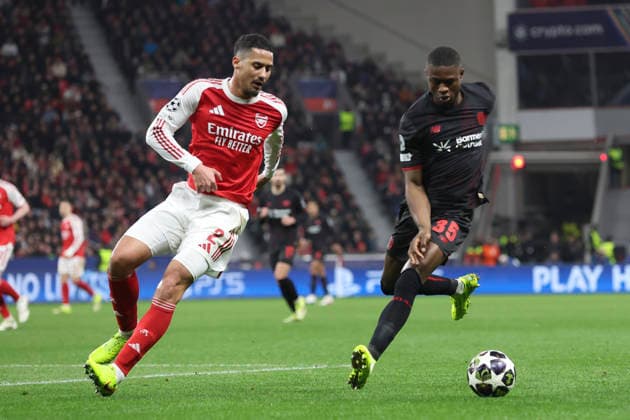 William Saliba Arsenal FC and Christian Kofane Bayer 04 Leverkusen battle for the ball during the UEFA Champions League 2025 26 Round of 16 First Leg match between Bayer 04 Leverkusen and Arsenal FC at BayArena on March 11, 2026 in Leverkusen, Germany Photo by Oliver Kaelke DeFodi Images