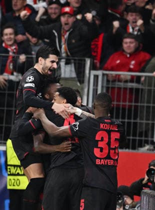 11 03 2026, xophax, Soccer , UEFA Champions League , 2025 2026 , Bayer Leverkusen vs FC Arsenal London from l to r Martin Terrier, Jarell Quansah ,Christian Kofane Bayer 04 celebrating after the 1 to 0 with Robert Andrich Leverkusen