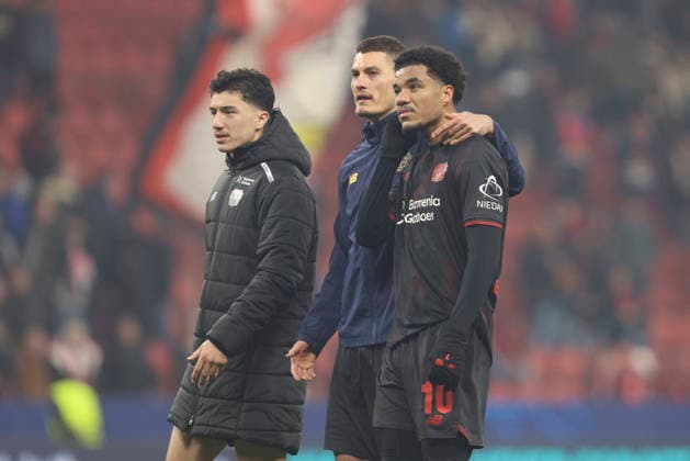 Ibrahim Maza Bayer 04 Leverkusen , Patrik Schick Bayer 04 Leverkusen and Malik Tillmann Bayer 04 Leverkusen looks on during the UEFA Champions League 2025 26 Round of 16 First Leg match between Bayer 04 Leverkusen and Arsenal FC at BayArena on March 11, 2026 in Leverkusen, Germany Photo by Oliver Kaelke DeFodi Images