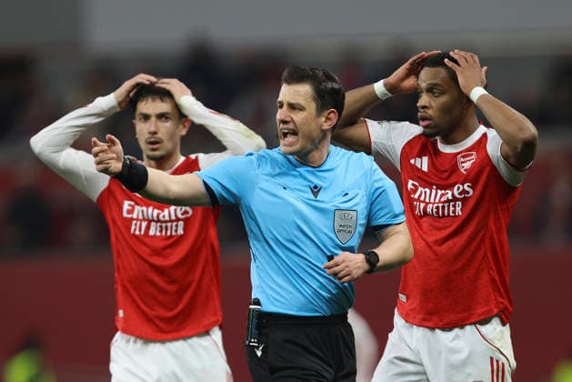 referee Halil Umut Meler gestures during the UEFA Champions League 2025 26 Round of 16 First Leg match between Bayer 04 Leverkusen and Arsenal FC at BayArena on March 11, 2026 in Leverkusen, Germany Photo by Oliver Kaelke DeFodi Images