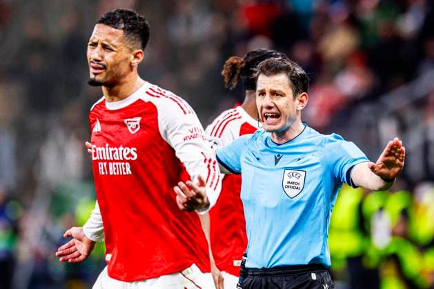 Referee Umut Meler is in discussion with William Saliba of Arsenal FC Bayer 04 Leverkusen v Arsenal FC, UEFA Champions League 2025 26 Round of 16 First Leg, Bayer 04 Leverkusen v Arsenal FC, BayArena, March 11, 2026, Leverkusen, Germany.