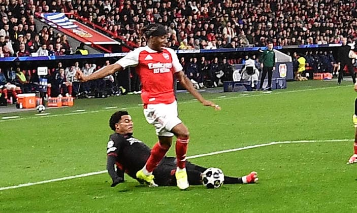 11 03 2026, xhbx, Football UEFA Champions League, Bayer 04 Leverkusen FC Arsenal London v l Malik Tillman Bayer Leverkusen , Noni Madueke Arsenal London FC , Foul leading to penalty goal by Kai Havertz Arsenal London FC DFL DFB REGULATIONS PROHIBIT ANY USE OF PHOTOGRAPHS as IMAGE SEQUENCES and or QUASI VIDEO Leverkusen