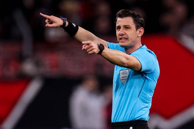 LEVERKUSEN, GERMANY - MARCH 11: referee Umut Meler gestures during the UEFA Champions League 2025 26 Round of 16 First Leg match between Bayer 04 Leverkusen and Arsenal FC at BayArena on March 11, 2026 in Leverkusen, Germany.  Copyright: xRenexNijhuis MBxMediax