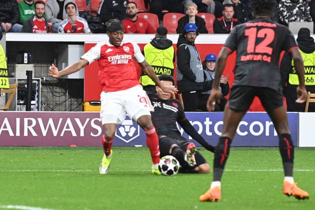 After this foul by Malik TILLMAN LEV on Noni MADUEKE Arsenal referee Halil Umut MELER TUR gives a penalty, Football Champions League, Round of 16, Bayer 04 Leverkusen LEV FC Arsenal London ARS 1 1 on 11 03 2026 in Leverkusen Germany UEFA regulations prohibit any use of photographs as image sequences and or quasi video Â