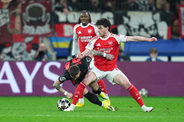 Declan Rice FC Arsenal and Aleix Garcia Bayer 04 Leverkusen battle for the ball during Bayer Leverkusen and FC Arsenal at BayArena, Leverkusen, Germany on March 11, 2026 Thor Wegner DeFodi Images Photo by DeFodi Images