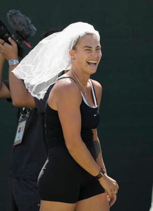 March 11, 2026 Aryna Sabalenka wears a bridal veil that a fan threw to her during a workout at the BNP Paribas Open held at the Indian Wells Tennis Garden in Indian Wells, California. California. Mandatory Photo Credit : CSM Indian Wells United States of America - ZUMAc04_ 20260311_zma_c04_060 Copyright: xCharlesxBausx