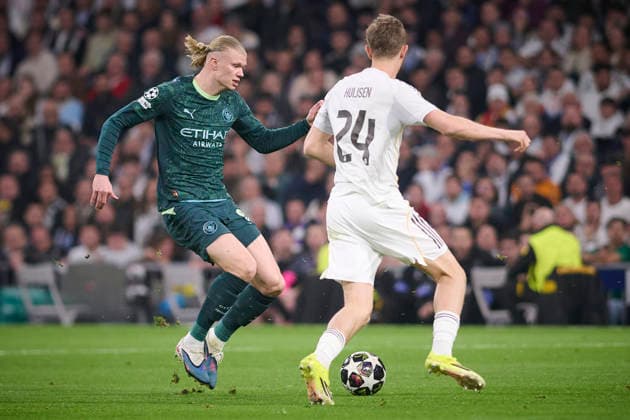 REAL MADRID CF v MANCHESTER CITY FC. CHAMPIONS LEAGUE 2025 2026. ROUND OF 16 FIRST LEG. Real Madrid CF s Dean Huijsen (r) and Manchester City FC s Erling Haaland during Champions League 2025 2026 match. March 11,2026. (ALTERPHOTOS Ropero) MadridSpain  Copyright: xRoperox