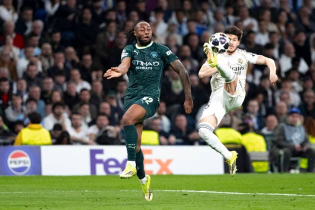 UEFA champions league - Real Madrid vs Manchester City MADRID, SPAIN - March 11:Fran Garcia of Real Madrid and Antoine Semenyo of Manchester City in action during the UEFA champions league 2025 26 round of 16 first leg match between Real Madrid and Manchester City at Santiago Bernabeu Stadium. (Photo by Guille Martinez f22photo) Madrid Santiago Bernabeu Stadium Spain Copyright: xGuillermoxMartinezx