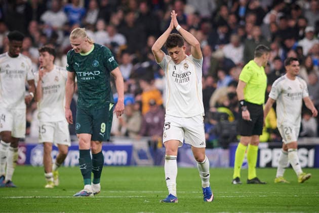 REAL MADRID CF v MANCHESTER CITY FC. CHAMPIONS LEAGUE 2025 2026. ROUND OF 16 FIRST LEG. Real Madrid CF s Arda Guler (r) celebrates.a goal and Manchester City FC s Erling Haaland dejected during Champions League 2025 2026 match. March 11,2026. (ALTERPHOTOS Ropero) MadridSpain  Copyright: xRoperox