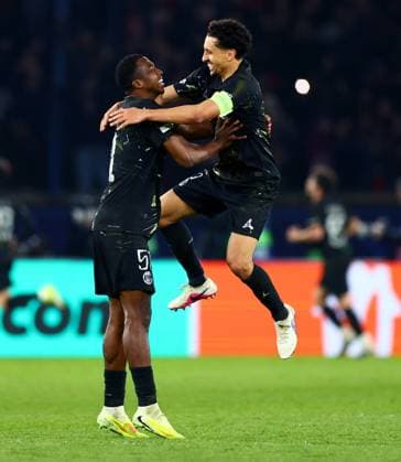 Marquinhos and William Pacho of Paris Saint-Germain celebrate after Khvicha Kvaratskhelia of Paris Saint-Germain scores their sides fifth goal. Paris Saint-Germain v Chelsea, UEFA Champions League, Round of 16, First Leg, Football, Parc des Princes, Paris, France - 11 Mar 2026Paris Parc des Princes France EDITORIAL USE ONLY No use with unauthorised audio, video, data, fixture lists, club league logos or live services. Online in-match use limited to 120 images, no video emulation. No use in betting, games or single club league player publications. Copyright: xJamesxMarsh Shutterstockx 16746728dr