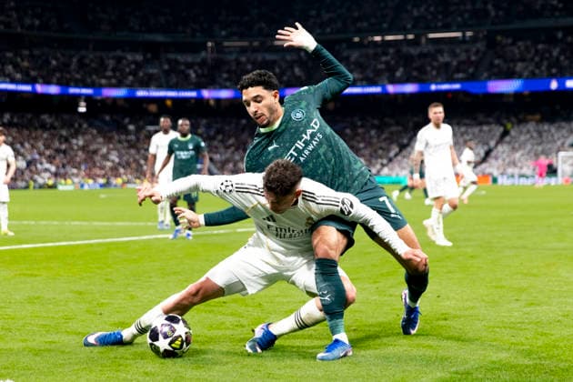 UEFA champions league - Real Madrid vs Manchester City MADRID, SPAIN - March 11:Federico Valverde of Real Madrid and Omar Marmoush of Manchester City in action during the UEFA champions league 2025 26 round of 16 first leg match between Real Madrid and Manchester City at Santiago Bernabeu Stadium. (Photo by Guille Martinez f22photo) Madrid Santiago Bernabeu Stadium Spain Copyright: xGuillermoxMartinezx