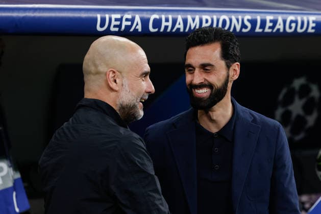 March 11, 2026, Madrid, Madrid, Spain: Alvaro Arbeloa, head coach of Real Madrid, greets Pep Guardiola, head coach of Manchester City during the UEFA Champions League 2025 26 Round of 16 First Leg match between Real Madrid C.F. and Manchester City at Bernabeu stadium on March 11, 2026, in Madrid, Spain. Madrid Spain - ZUMAa181 20260311_zaa_a181_173 Copyright: xDennisxAgyemanx