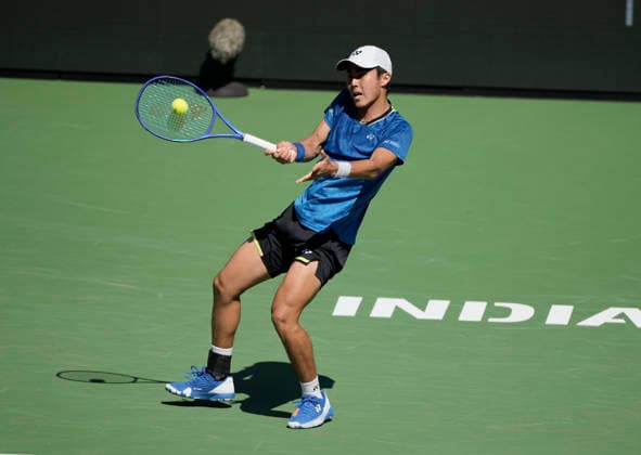 March 11, 2026 Rinky Hijikata (AUS) returns a shot against Cameron Norrie (GBR) during their fourth round match at the BNP Paribas Open held at the Indian Wells Tennis Garden in Indian Wells, California. California. Mandatory Photo Credit : CSM Indian Wells United States of America - ZUMAc04_ 20260311_zma_c04_119 Copyright: xCharlesxBausx