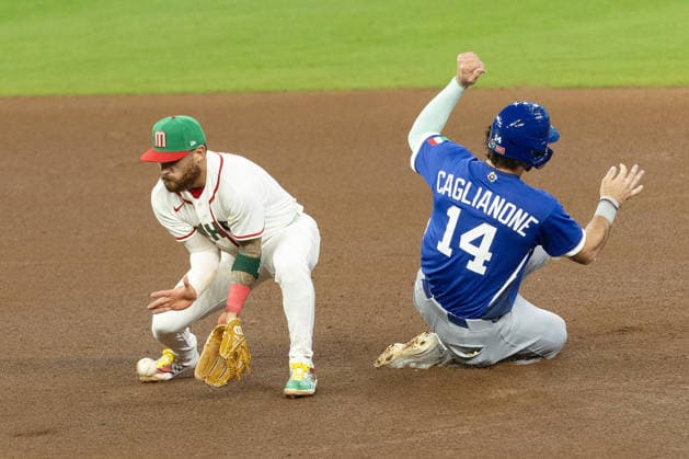 Jac Caglianone (R) of Italy slides past Joey Ortiz (L) of Mexico in a World Baseball Classic game between Mexico and Italy at Daikin Park stadium in Houston, United States, 11 March 2026. World Baseball Classic - Mexico vs. Italy !ACHTUNG: NUR REDAKTIONELLE NUTZUNG!  Copyright: xCarlosxRamírezx AMDEP2197 20260312-55019667931_1