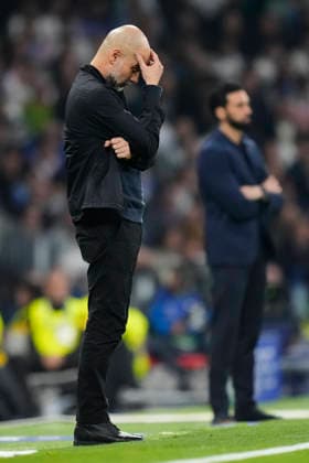 Real Madrid CF v Manchester City FC - UEFA Champions League 2025 26 Round of 16 First Leg Pep Guardiola head coach of Manchester City and Spain dejected during the UEFA Champions League 2025 26 Round of 16 First Leg match between Real Madrid CF and Manchester City FC at Estadio Santiago Bernabeu on March 11, 2026 in Madrid, Spain. Madrid Spain  Copyright: xJosexBretonx originalFilename:bretonhernandez-realmadr260311_npSEB.jpg