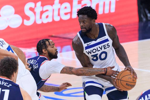 March 11, 2026, Inglewood, California, USA: Derrick Jones Jr. 5 of the Los Angeles Clippers attempts to steal the ball from Julius Randle 30 of the Minnesota Timberwolves during their regular season NBA, Basketball Herren, USA game on Wednesday March 11, 2026 at Intuit Dome in Inglewood, California. ARIANA RUIZ PI Inglewood USA - ZUMAp124 20260311_zaa_p124_072 Copyright: xArianaxRuizx