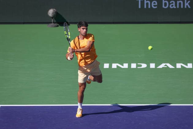 INDIAN WELLS, CA - MARCH 11: Carlos Alcaraz (ESP) hits a backhand during the BNP Paribas Open on March 11, 2026 at Indian Wells Tennis Garden in Indian Wells, CA. (Photo by George Walker Icon Sportswire) TENNIS: MAR 11 BNP Paribas Open EDITORIAL USE ONLY Icon260311077