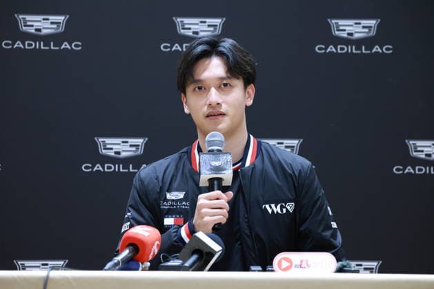SHANGHAI, CHINA - MARCH 11: Zhou Guanyu, China s first-ever Formula 1 driver, attends Cadillac event on March 11, 2026 in Shanghai, China.  Copyright: xVCGx 111627360059
