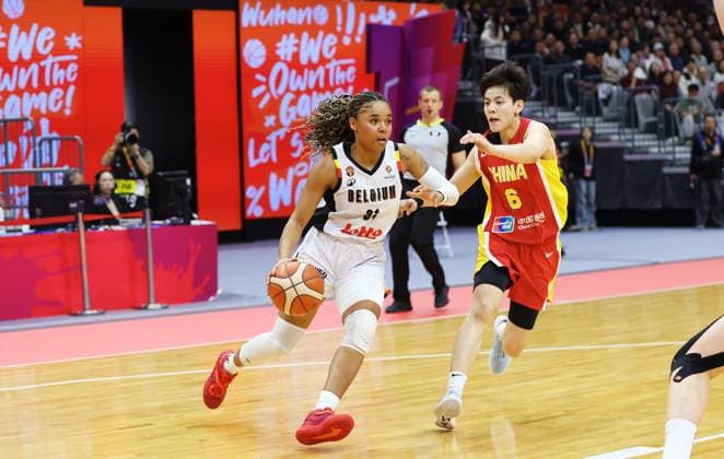 Belgium s Maxuella Lisowa Mbaka and Shuyu Yang fight for the ball during a basket game between China and Belgium s national team, Nationalteam Belgian Cats, in Wuhan, China, on Thursday 12 March 2026, the second game (out of 5) of the qualifications phase for the World Cup Basket tournament. NIKOLAxKRSTIC  x167247708x