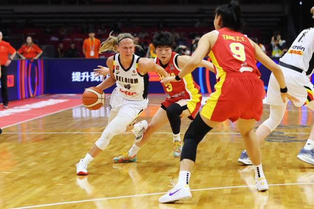 Belgium s Julie Allemand and China Jiaqi Wang fight for the ball during a basket game between China and Belgium s national team, Nationalteam Belgian Cats, in Wuhan, China, on Thursday 12 March 2026, the second game (out of 5) of the qualifications phase for the World Cup Basket tournament. NIKOLAxKRSTIC  x167250261x