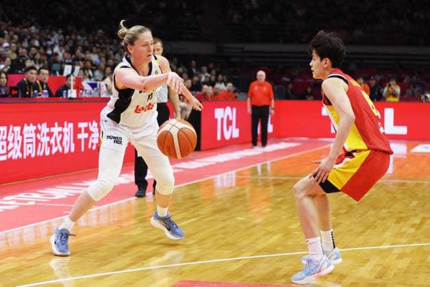 Belgium s Emma Meesseman fights for the ball during a basket game between China and Belgium s national team, Nationalteam Belgian Cats, in Wuhan, China, on Thursday 12 March 2026, the second game (out of 5) of the qualifications phase for the World Cup Basket tournament. NIKOLAxKRSTIC  x167250305x