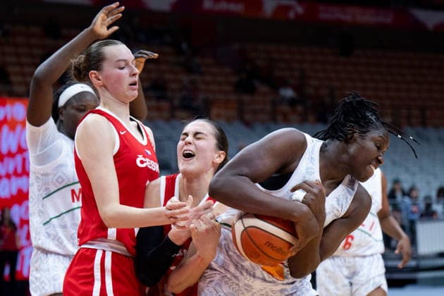 (260312) -- WUHAN, March 12, 2026 -- Sika Kone (1st R) of Mali vies with Eliska Hamzova (2nd R) of the Czech Republic during the group A match between the Czech Republic and Mali at FIBA Women s World Cup Qualifying Tournaments in Wuhan, central China s Hubei Province, Feb. 12, 2026. ) (SP)CHINA-WUHAN-FIBA-WOMEN S WORLD CUP 2026-QUALIFYING-MLI VS CZE(CN) WuxZhizun 