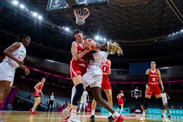 (260312) -- WUHAN, March 12, 2026 -- Maimouna Haidara (3rd L) of Mali vies with Natalie Stoupalova (2nd L) of the Czech Republic during the group A match between the Czech Republic and Mali at FIBA Women s World Cup Qualifying Tournaments in Wuhan, central China s Hubei Province, Feb. 12, 2026. ) (SP)CHINA-WUHAN-FIBA-WOMEN S WORLD CUP 2026-QUALIFYING-MLI VS CZE(CN) WuxZhizun 