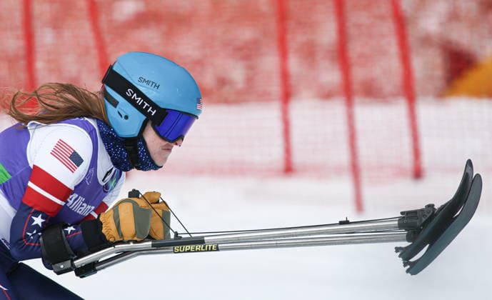 ITALY, CORTINA D AMPEZZO - MARCH 12, 2026: Kelsey O Driscoll of the USA competes in a women s para alpine skiing giant slalom standing event at the Tofane Alpine Skiing Centre during the 2026 Winter Paralympic Games, in Cortina d Ampezzo, Province of Belluno. Mikhail Tereshchenko TASS  89926040