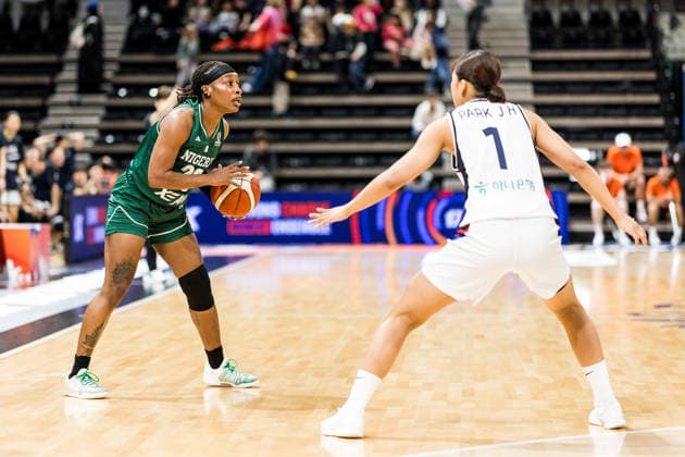 LYON-VILLEURBANNE, FRANCE - MARCH 12: Ezinne Kalu (Nigeria, 23) controls the ball against Jihyun Park (Republic of Korea, 1) during the FIBA Women™s World Cup Qualifying Tournament match between Republic of Korea (KOR) vs. Nigeria (NGR) at Astroballe on matchday 2 of the FIBA Women™s World Cup Qualifying Tournament on March 12, 2026 in Lyon-Villeurbanne, France. France Copyright: xSteffiexWunderlx