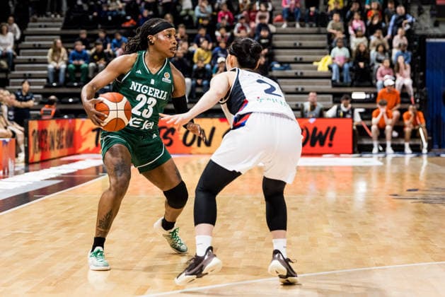 LYON-VILLEURBANNE, FRANCE - MARCH 12: Ezinne Kalu (Nigeria, 23) controls the ball against Yeeun Heo (Republic of Korea, 2) during the FIBA Women™s World Cup Qualifying Tournament match between Republic of Korea (KOR) vs. Nigeria (NGR) at Astroballe on matchday 2 of the FIBA Women™s World Cup Qualifying Tournament on March 12, 2026 in Lyon-Villeurbanne, France. France Copyright: xSteffiexWunderlx