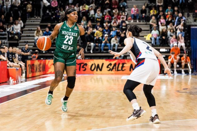 LYON-VILLEURBANNE, FRANCE - MARCH 12: Ezinne Kalu (Nigeria, 23) controls the ball against Yeeun Heo (Republic of Korea, 2) during the FIBA Women™s World Cup Qualifying Tournament match between Republic of Korea (KOR) vs. Nigeria (NGR) at Astroballe on matchday 2 of the FIBA Women™s World Cup Qualifying Tournament on March 12, 2026 in Lyon-Villeurbanne, France. France Copyright: xSteffiexWunderlx