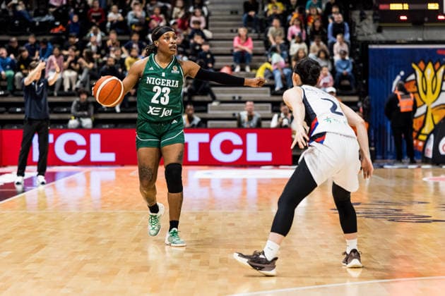 LYON-VILLEURBANNE, FRANCE - MARCH 12: Ezinne Kalu (Nigeria, 23) controls the ball against Yeeun Heo (Republic of Korea, 2) during the FIBA Women™s World Cup Qualifying Tournament match between Republic of Korea (KOR) vs. Nigeria (NGR) at Astroballe on matchday 2 of the FIBA Women™s World Cup Qualifying Tournament on March 12, 2026 in Lyon-Villeurbanne, France. France Copyright: xSteffiexWunderlx
