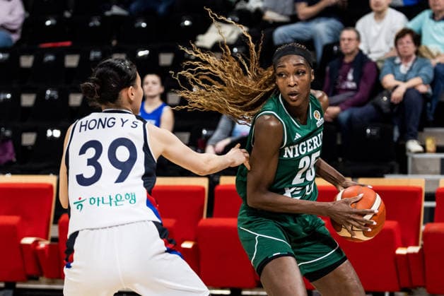 LYON-VILLEURBANNE, FRANCE - MARCH 12: Victoria Macaulay (Nigeria, 25) controls the ball against Yusun Hong (Republic of Korea, 39) during the FIBA Women™s World Cup Qualifying Tournament match between Republic of Korea (KOR) vs. Nigeria (NGR) at Astroballe on matchday 2 of the FIBA Women™s World Cup Qualifying Tournament on March 12, 2026 in Lyon-Villeurbanne, France. France Copyright: xSteffiexWunderlx