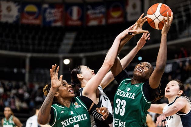 LYON-VILLEURBANNE, FRANCE - MARCH 12: Nicole Enabosi (Nigeria, 33) tries to control the ball against Republic of Korea (KOR) defense during the FIBA Women™s World Cup Qualifying Tournament match between Republic of Korea (KOR) vs. Nigeria (NGR) at Astroballe on matchday 2 of the FIBA Women™s World Cup Qualifying Tournament on March 12, 2026 in Lyon-Villeurbanne, France. France Copyright: xSteffiexWunderlx