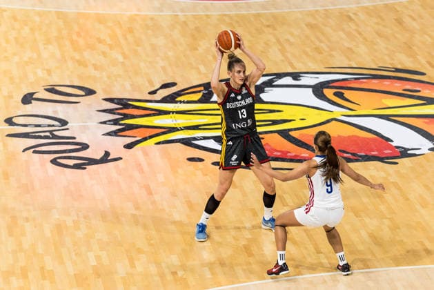 LYON-VILLEURBANNE, FRANCE - MARCH 12: Leonie Fiebich (Germany, 13) controls the ball against Louna Ozar (Philippines, 9) during the FIBA Women™s World Cup Qualifying Tournament match between Philippines (PHI) vs. Germany (GER) at Astroballe on matchday 2 of the FIBA Women™s World Cup Qualifying Tournament on March 12, 2026 in Lyon-Villeurbanne, France. France Copyright: xSteffiexWunderlx