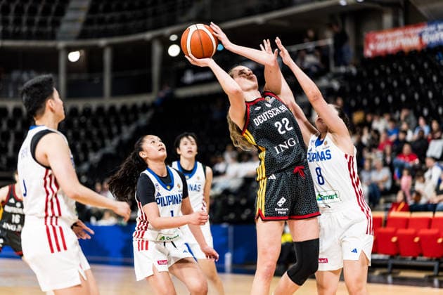LYON-VILLEURBANNE, FRANCE - MARCH 12: Emily Bessoir (Germany, 22) controls the ball against Angelica Surada (Philippines, 8) during the FIBA Women™s World Cup Qualifying Tournament match between Philippines (PHI) vs. Germany (GER) at Astroballe on matchday 2 of the FIBA Women™s World Cup Qualifying Tournament on March 12, 2026 in Lyon-Villeurbanne, France. France Copyright: xSteffiexWunderlx