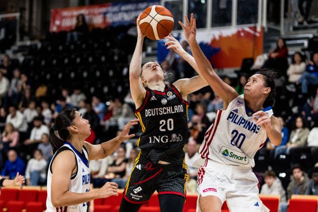 LYON-VILLEURBANNE, FRANCE - MARCH 12: Frieda Buehner (Bühner, Buhner Germany, 20) shoots the ball against Karl Ann Pingol (Philippines, 20) during the FIBA Women™s World Cup Qualifying Tournament match between Philippines (PHI) vs. Germany (GER) at Astroballe on matchday 2 of the FIBA Women™s World Cup Qualifying Tournament on March 12, 2026 in Lyon-Villeurbanne, France. France Copyright: xSteffiexWunderlx