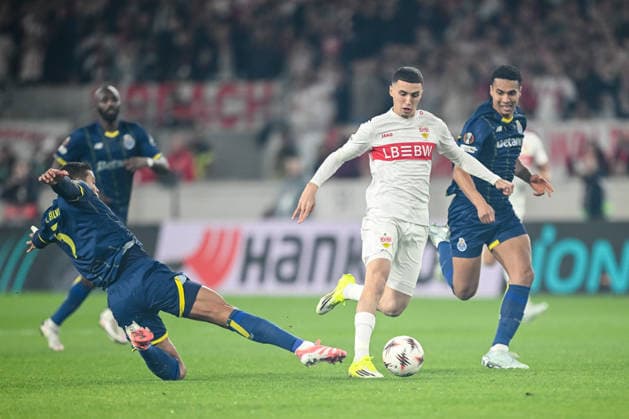 Jan Bednarek FC Porto and Bilal El Khannouss VfB Stuttgart battle for the ball during the UEFA Europa League 2025 26 Round of 16 First Leg match between VfB Stuttgart and FC Porto at Stuttgart Arena on March 12, 2026 in Stuttgart, Germany Photo by Harry Langer DeFodi Images
