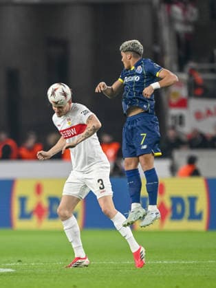 Ramon Hendriks VfB Stuttgart and William Gomes FC Porto battle for the ball during the UEFA Europa League 2025 26 Round of 16 First Leg match between VfB Stuttgart and FC Porto at Stuttgart Arena on March 12, 2026 in Stuttgart, Germany Photo by Harry Langer DeFodi Images