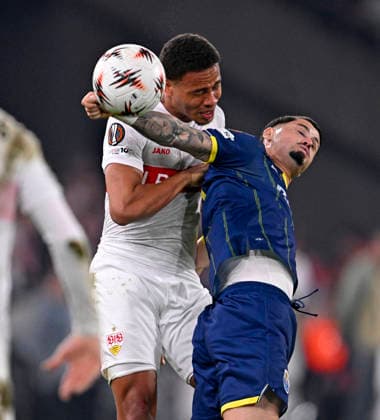 12 03 2026, Football UEFA Europa League 2025 2026 Round of 16, VfB Stuttgart FC Porto, in the MHP Arena Stuttgart, v l Nikolas Nartey Stuttgart vs Borja Sainz FC Porto DFL and DFB regulations prohibit any use of photographs as image sequences and or quasi video